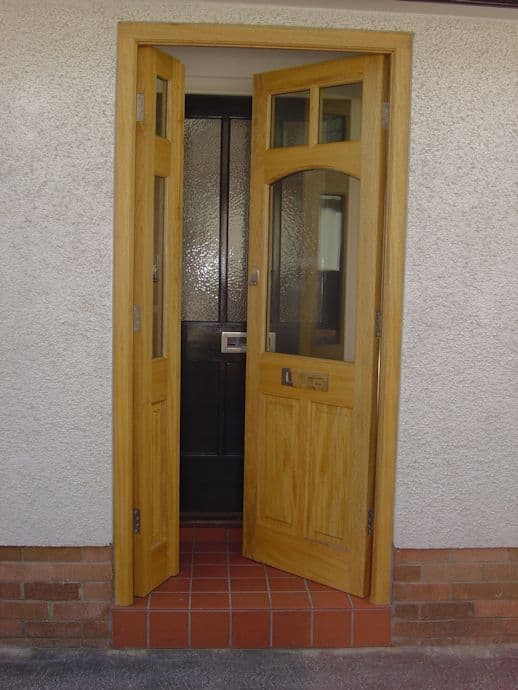 Hardwood French doors with brass handles