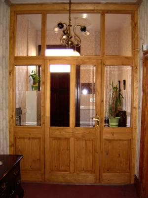 Softwood door with architrave