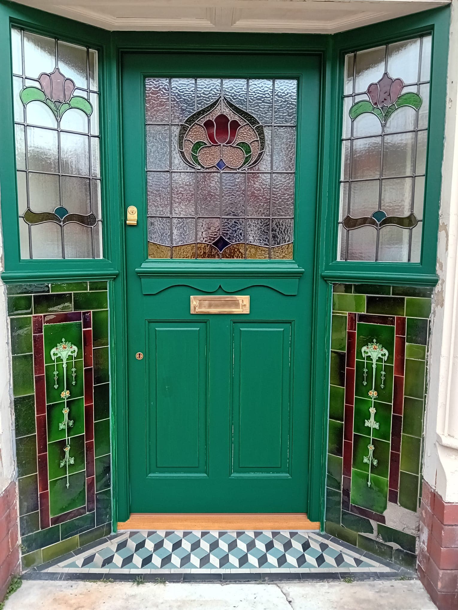 Victorian front door with ornate Art Nouveau stained glass panels