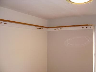 Bedroom with custom picture rail