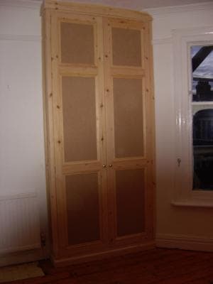 Double wardrobe with internal shelving