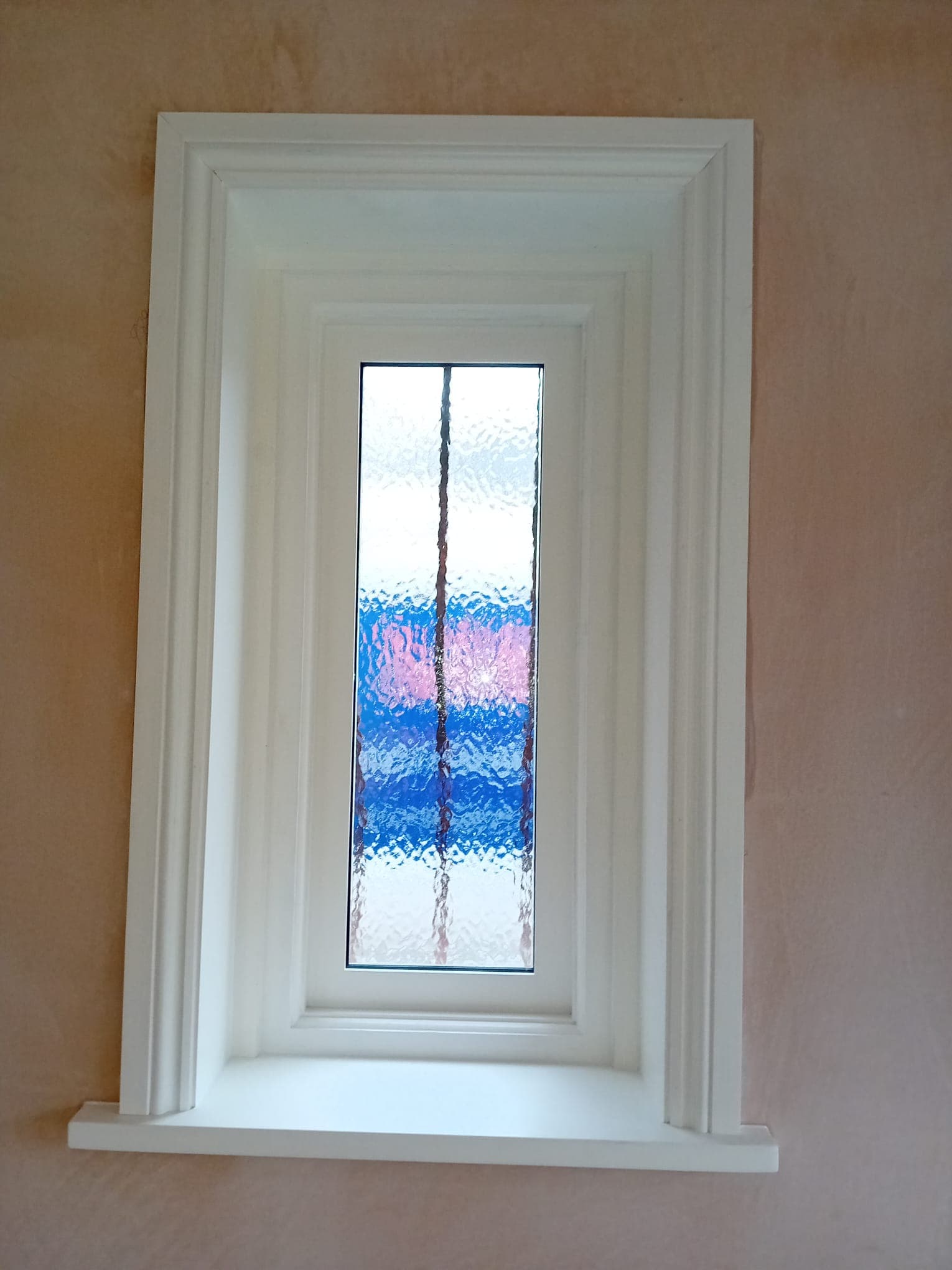 Custom interior window with decorative frosted glass