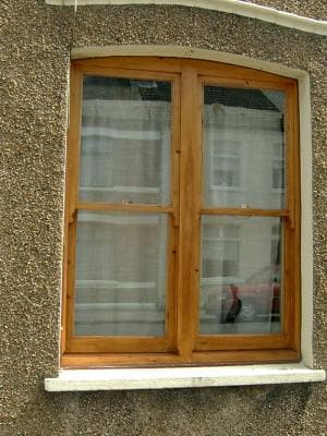Custom wooden window installation
