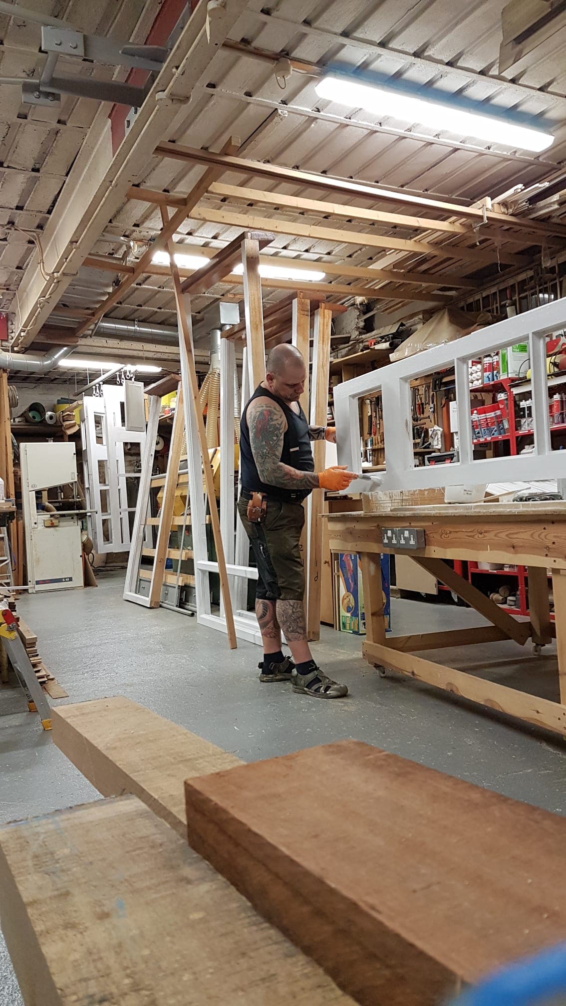 Master craftsman Martin working on detailed joinery